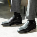 The Black Nested Diamonds men's dress sock — black sock with grey nested diamonds lifestyle image
