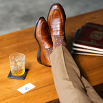 The Mocha Gemstones men's dress sock — mocha sock with navy, white & powder blue gemstones styled with tan trousers