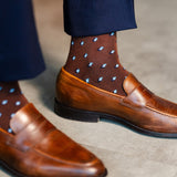 The Pecan Gemstones men's dress sock — pecan brown sock with navy, white & powder blue gemstones lifestyle image