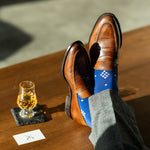 The Royal Blue Nested Diamonds men's dress sock — royal blue sock with white nested diamonds lifestyle image