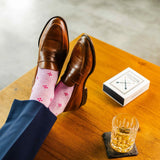 Heathered pink men's dress socks with a fuchsia flower pattern