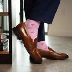 Heathered pink men's dress socks with a fuchsia flower pattern