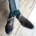 Hunter green men's dress sock with a contrasting sprinkle pattern