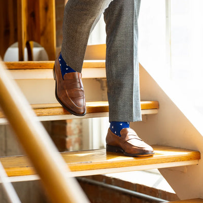 The Sailmakers - A Cobalt Blue Sock with White Sail Motifs