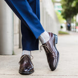 Light grey men's dress socks with an arctic blue vertical stripe pattern