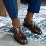 A mocha mousse sock with navy T-Suns