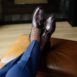 A mocha mousse brown men's dress sock with white and navy triangles