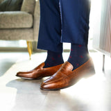 Navy blue men's sock with a garnet red flower pattern