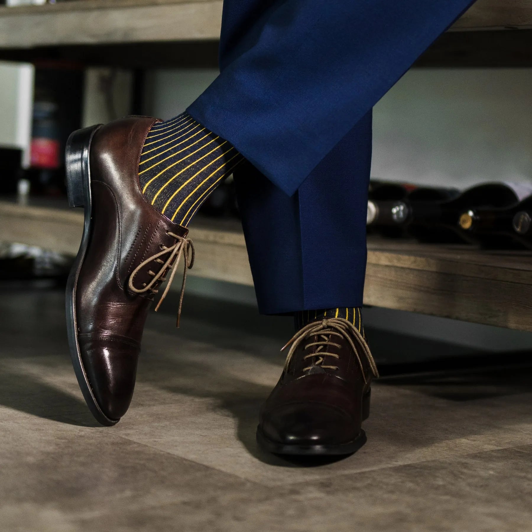 A Navy Blue men's dress Sock with a Yellow Ribbed pattern