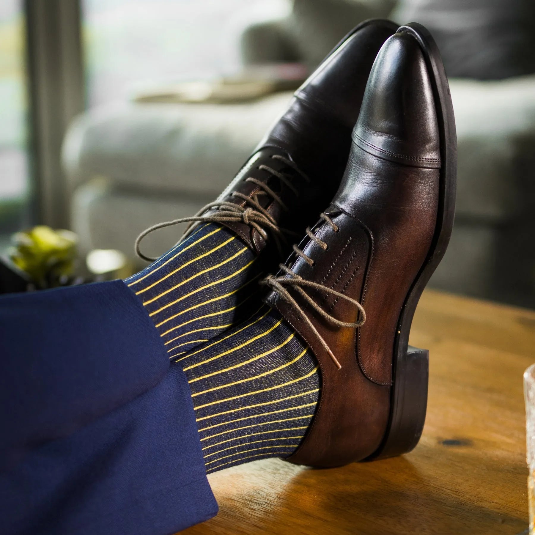 A Navy Blue men's dress Sock with a Yellow Ribbed pattern