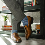 A Prussian Blue men's dress sock with an Arctic Blue Ribbed Pattern