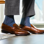 A Prussian Blue men's dress sock with an Arctic Blue Ribbed Pattern