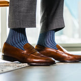A Prussian Blue men's dress sock with an Arctic Blue Ribbed Pattern