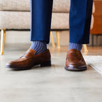 Prussian Blue men's dress socks with a pink ribbed pattern