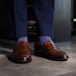 Prussian Blue men's dress socks with a pink ribbed pattern
