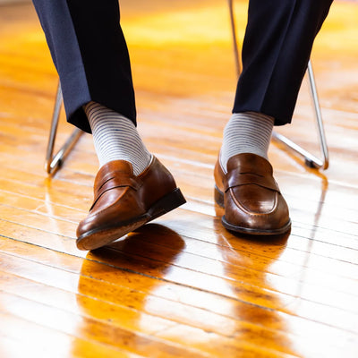 The Waterlines - A Stone Grey Sock with Deep Blue Stripes