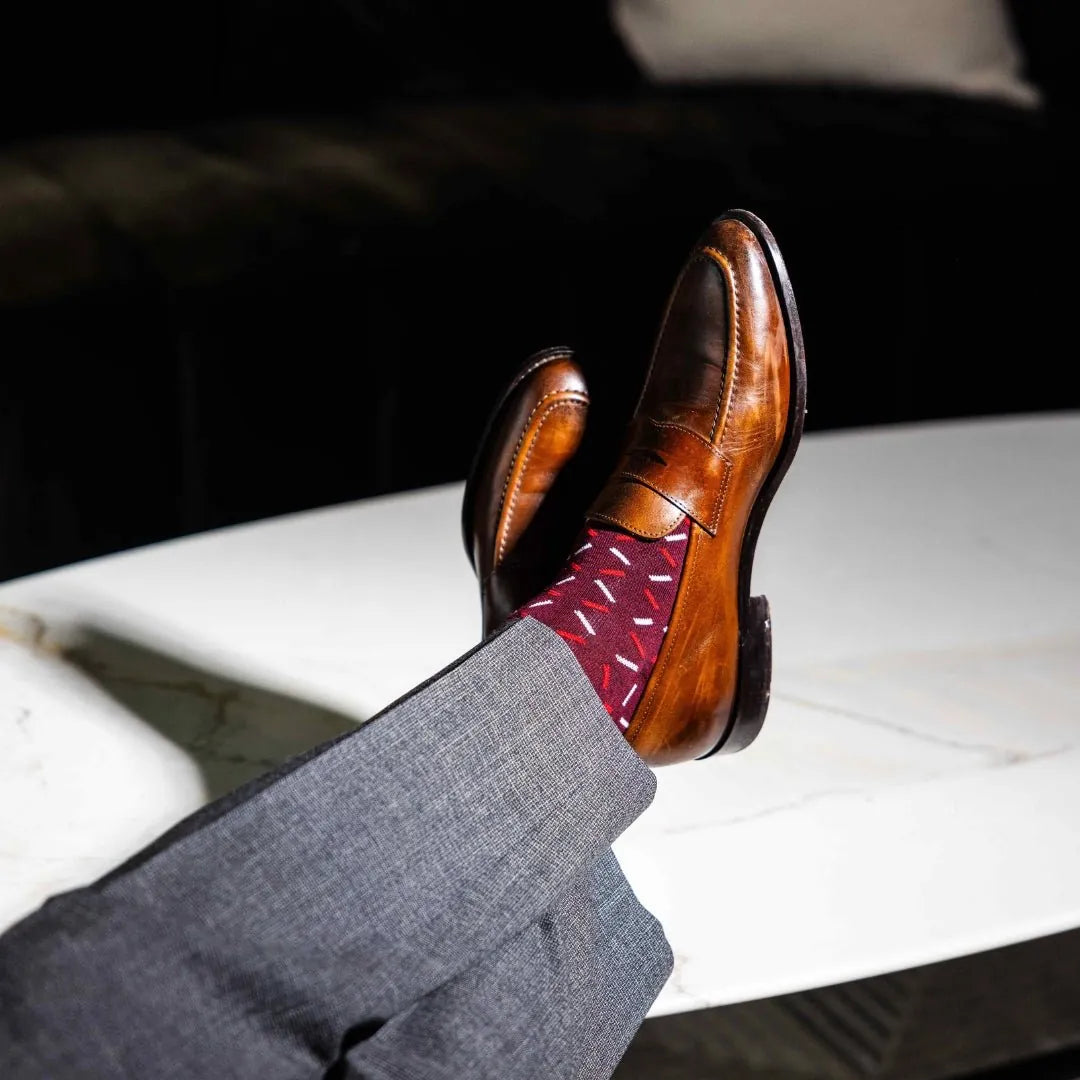 deep red men's dress sock with red and white x pattern