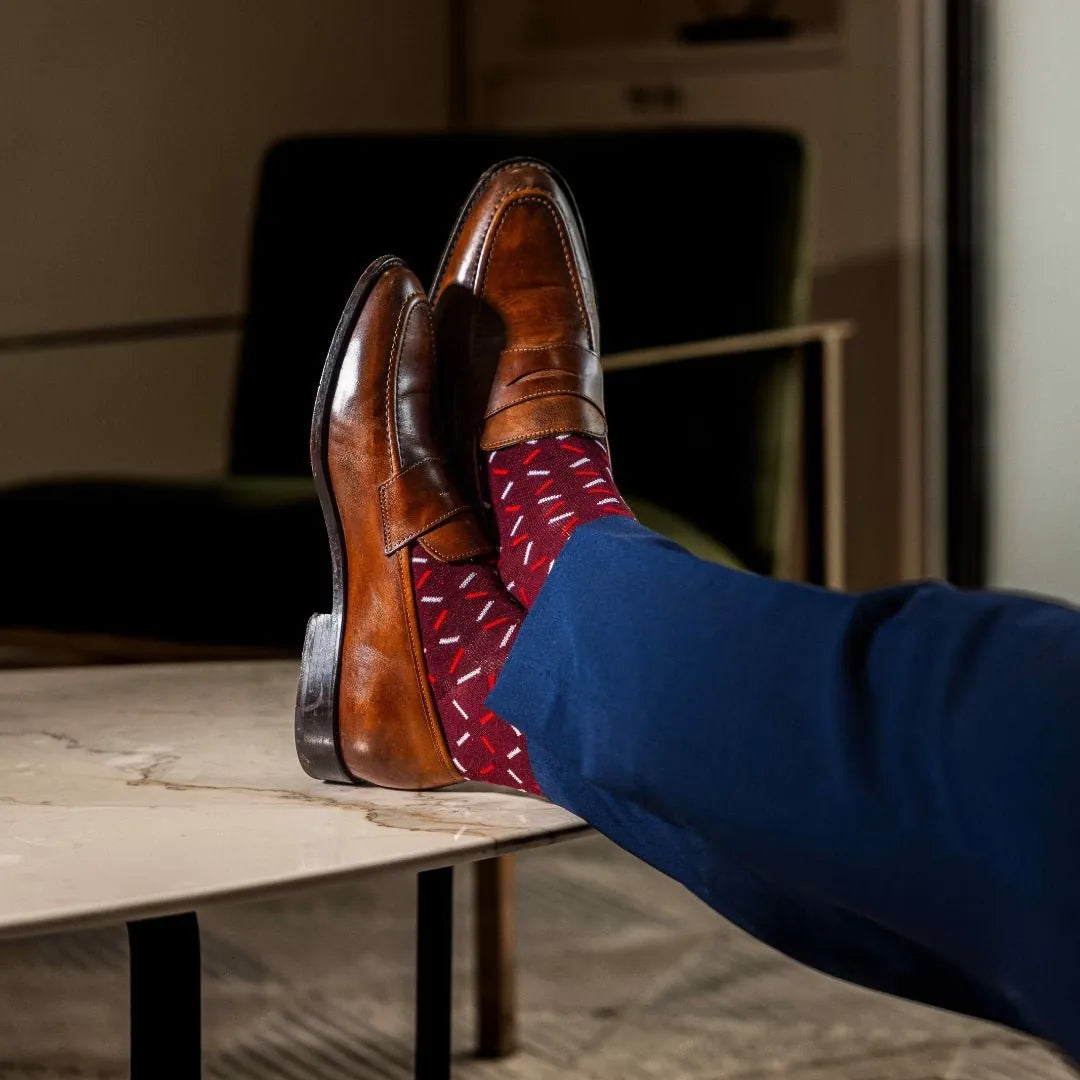 deep red men's dress sock with red and white x pattern