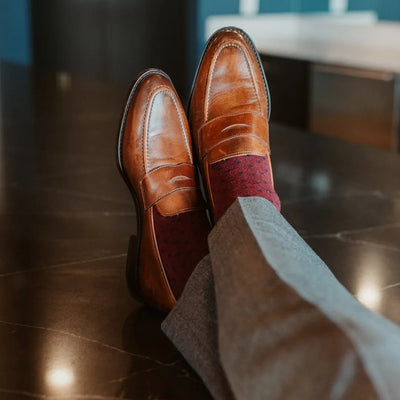 The Bartons - A Deep Red Sock with Navy Polka Dots