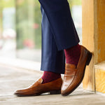 deep red men's dress sock with navy blue polkadots