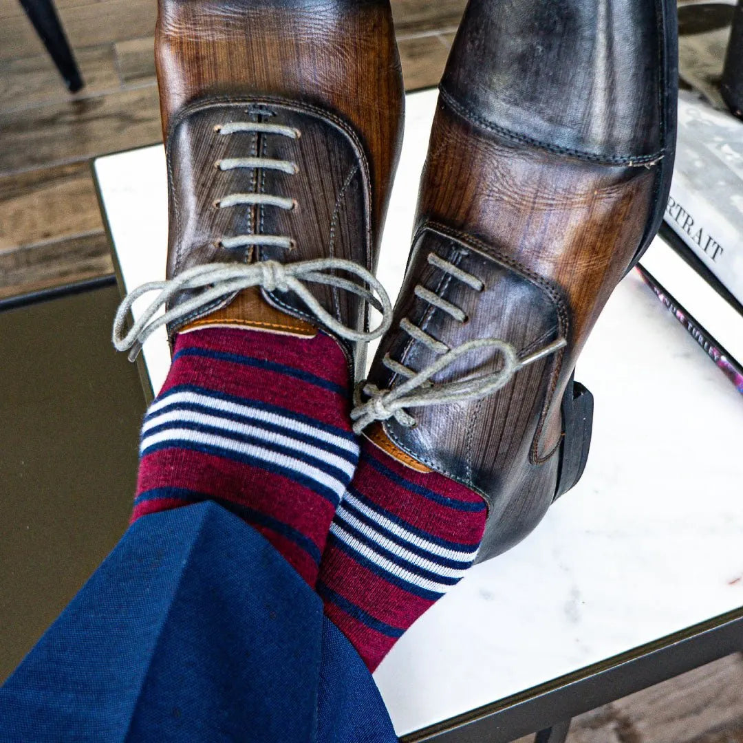 red, white, and blue multi-stripe patterned men's dress socks
