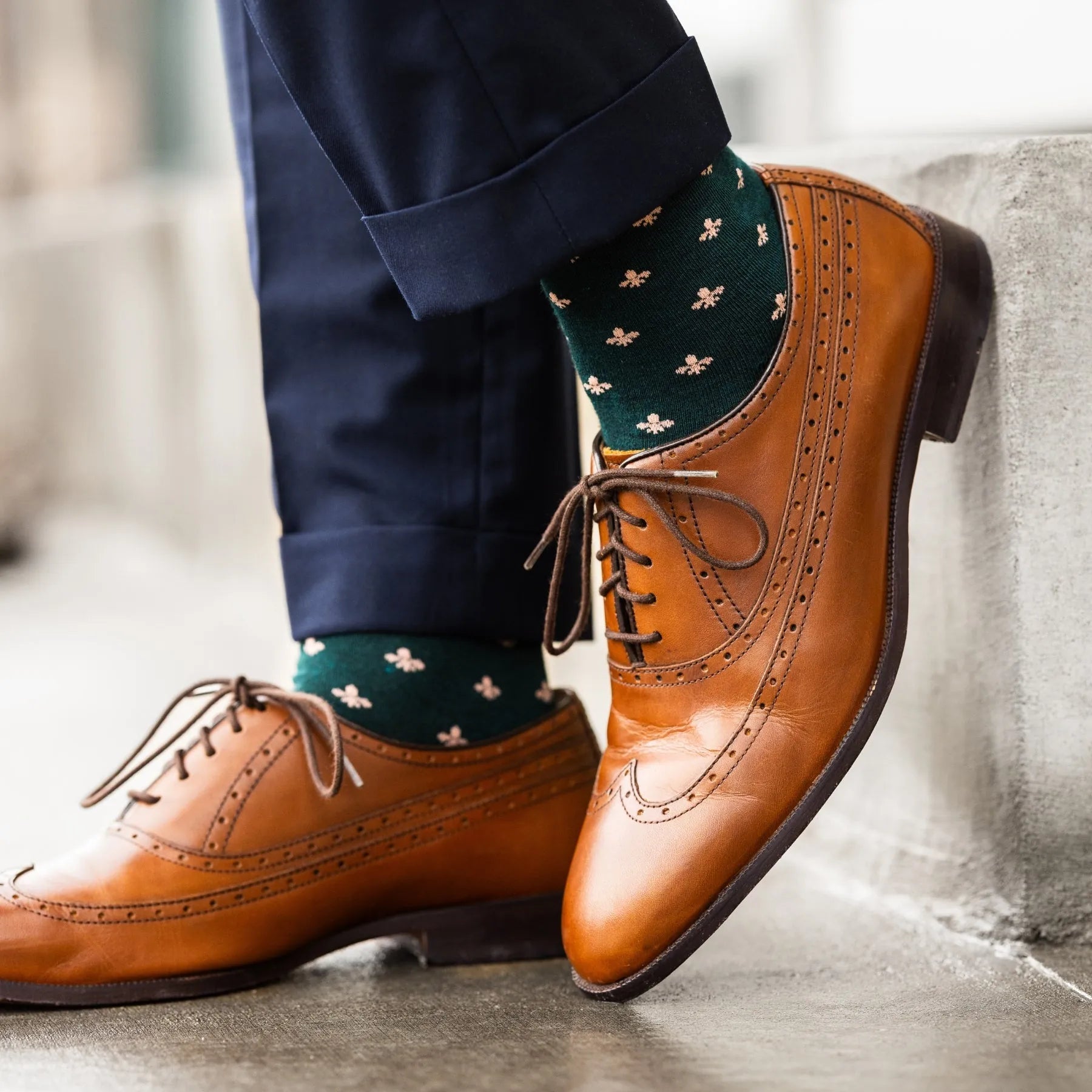 deep green men's dress socks with a peach colored French motif flower pattern