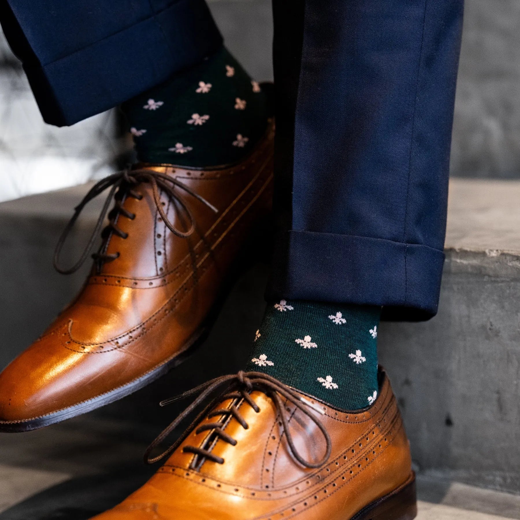 deep green men's dress socks with a peach colored French motif flower pattern