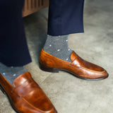 grey men's dress socks with a pale blue diamond pattern
