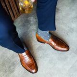 grey men's dress socks with a pale blue diamond pattern