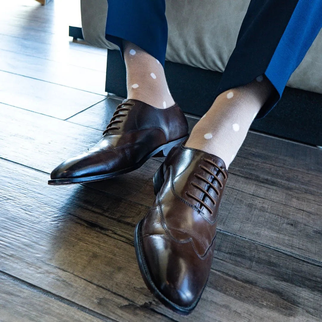 Tan men's dress socks with white polka dots