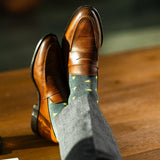 The Holiday Pines - A Charcoal-Green Sock with Pine Tree Motifs