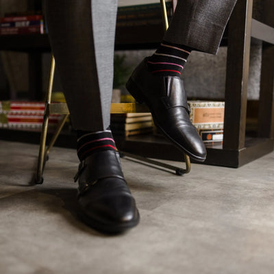 The Hughes - A Black Sock with Varying Pastel Stripes