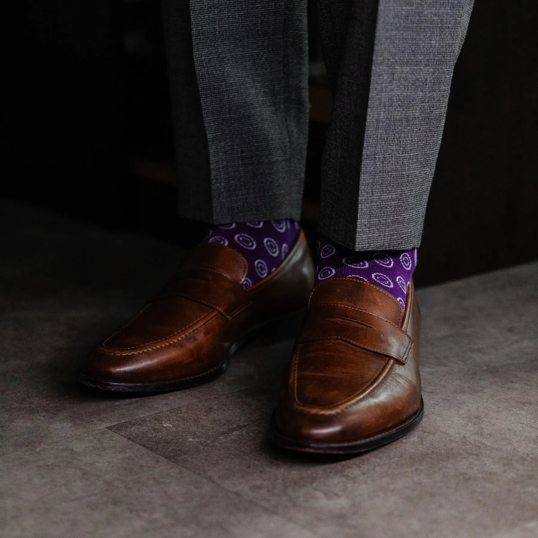 a deep purple men's dress sock with a white double dot pattern