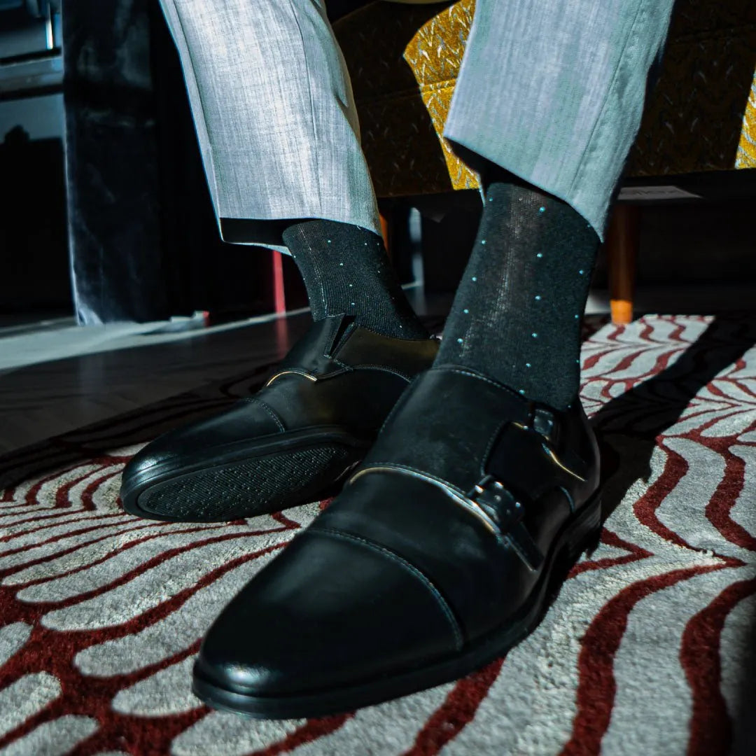 black men's dress sock with light blue pin dots
