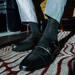 black men's dress sock with light blue pin dots