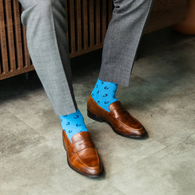 The Penchins - A Sky Blue Sock with Black Horseshoes