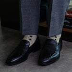 Gold men's dress sock with black rounded hatch pattern