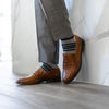 The Salvators - A Green, Gray and White Striped Sock