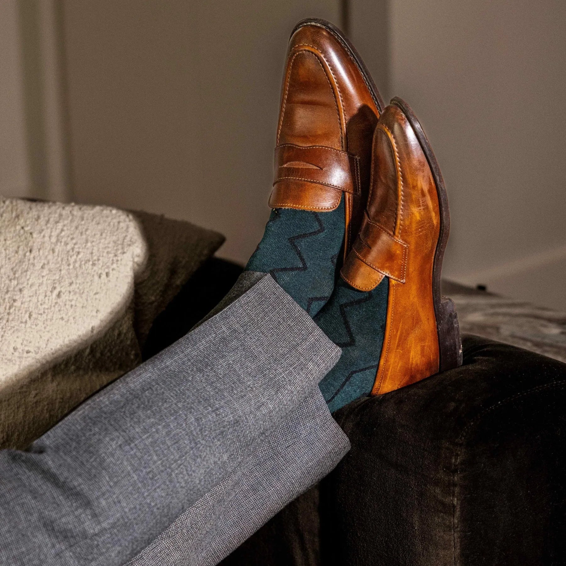 Deep green men's dress socks with black zigzag pattern