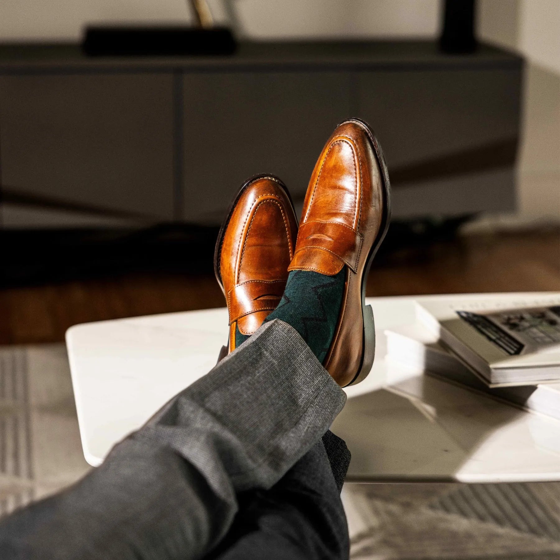 Deep green men's dress socks with black zigzag pattern