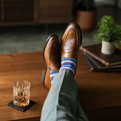 The Whitakers - A Blue, Red and White Striped Sock