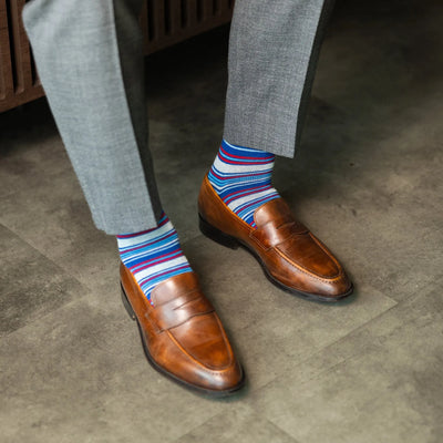 The Whitakers - A Blue, Red and White Striped Sock