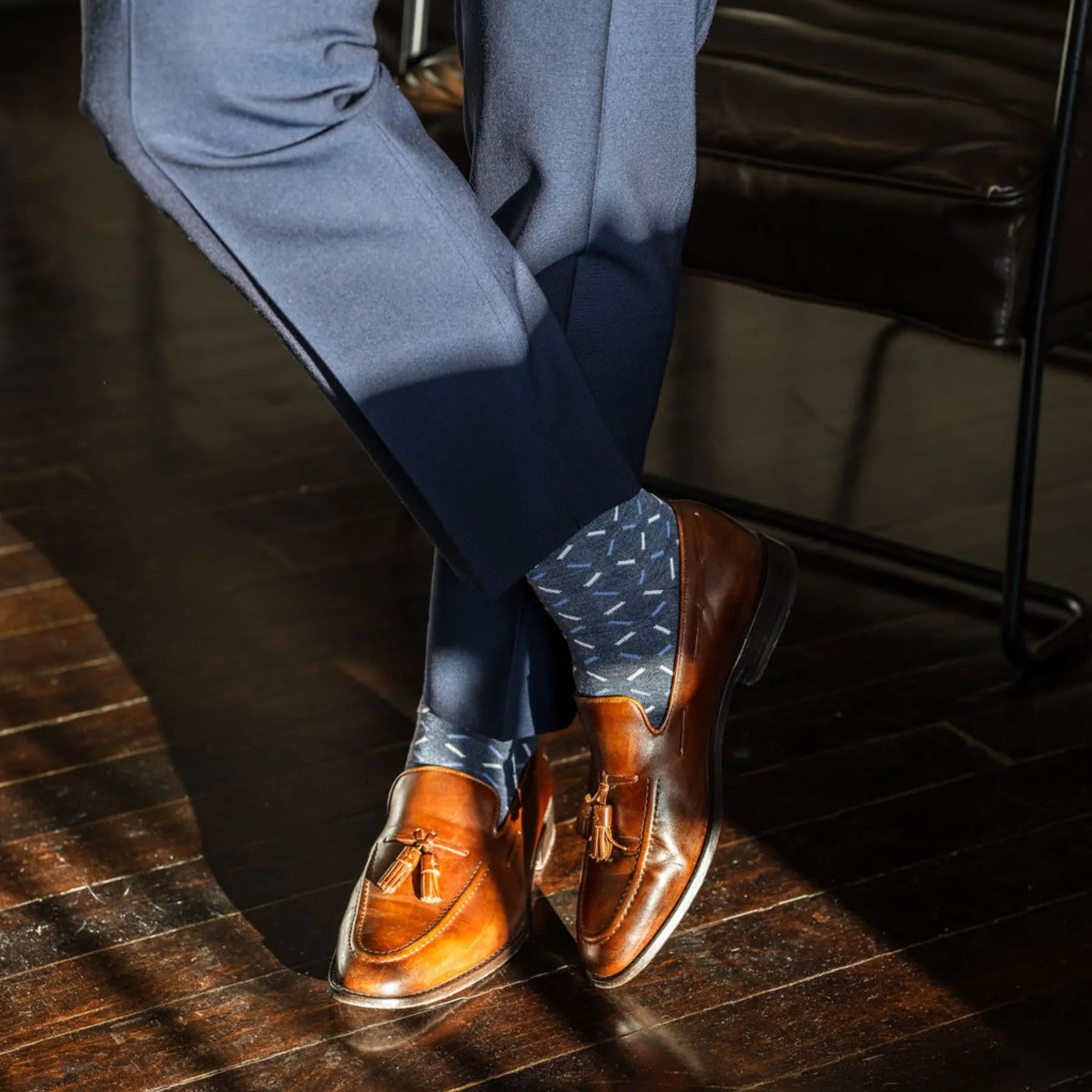 dark blue men's dress socks with light blue and white x pattern