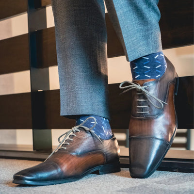 The Winter Wonderlands -  A Deep Blue Sock with a Light Blue and White "X" Pattern