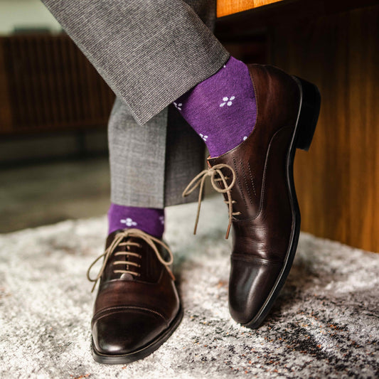 Purple men's dress sock with a white flower pattern