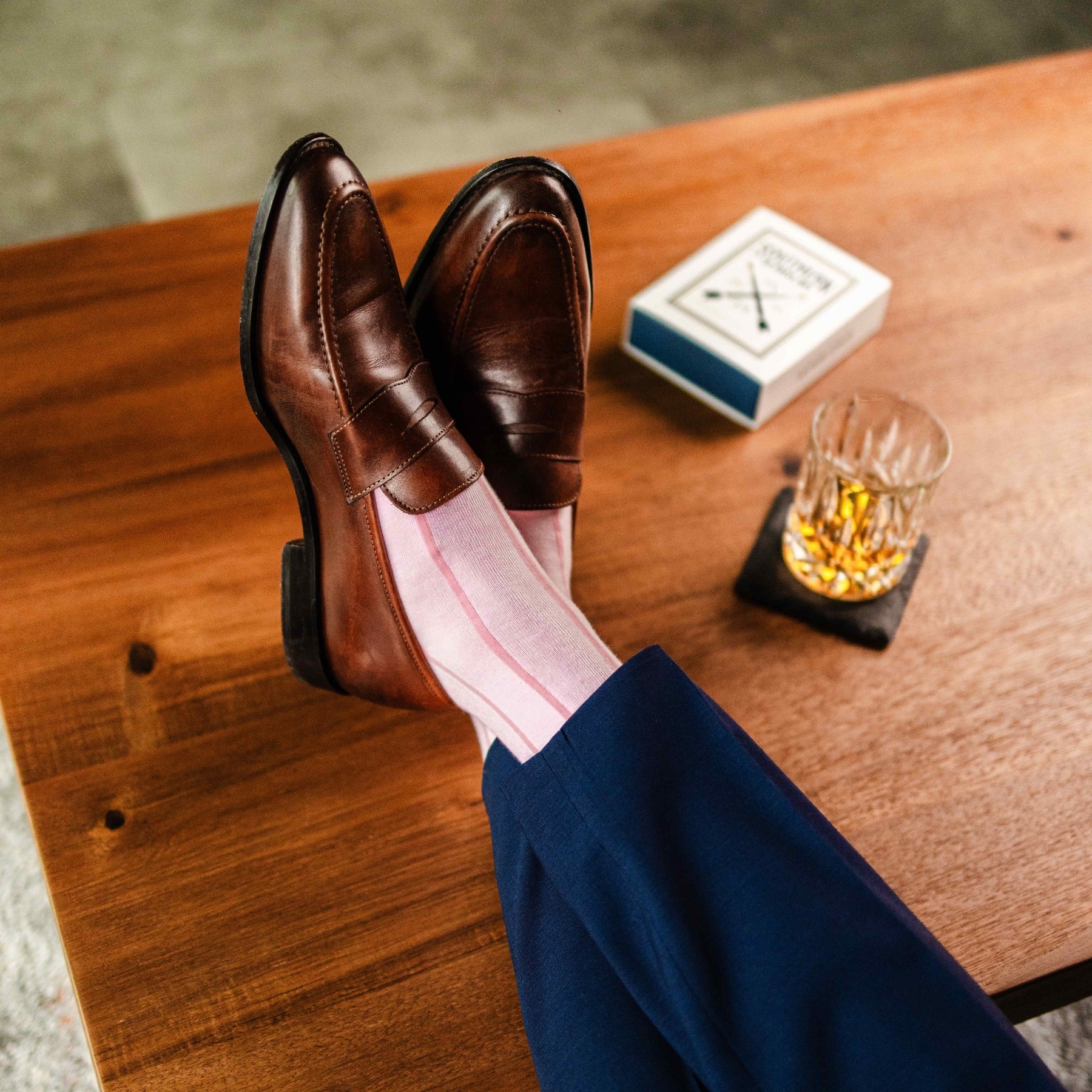 Blush pink men's dress socks with a bubblegum pink vertical stripe pattern