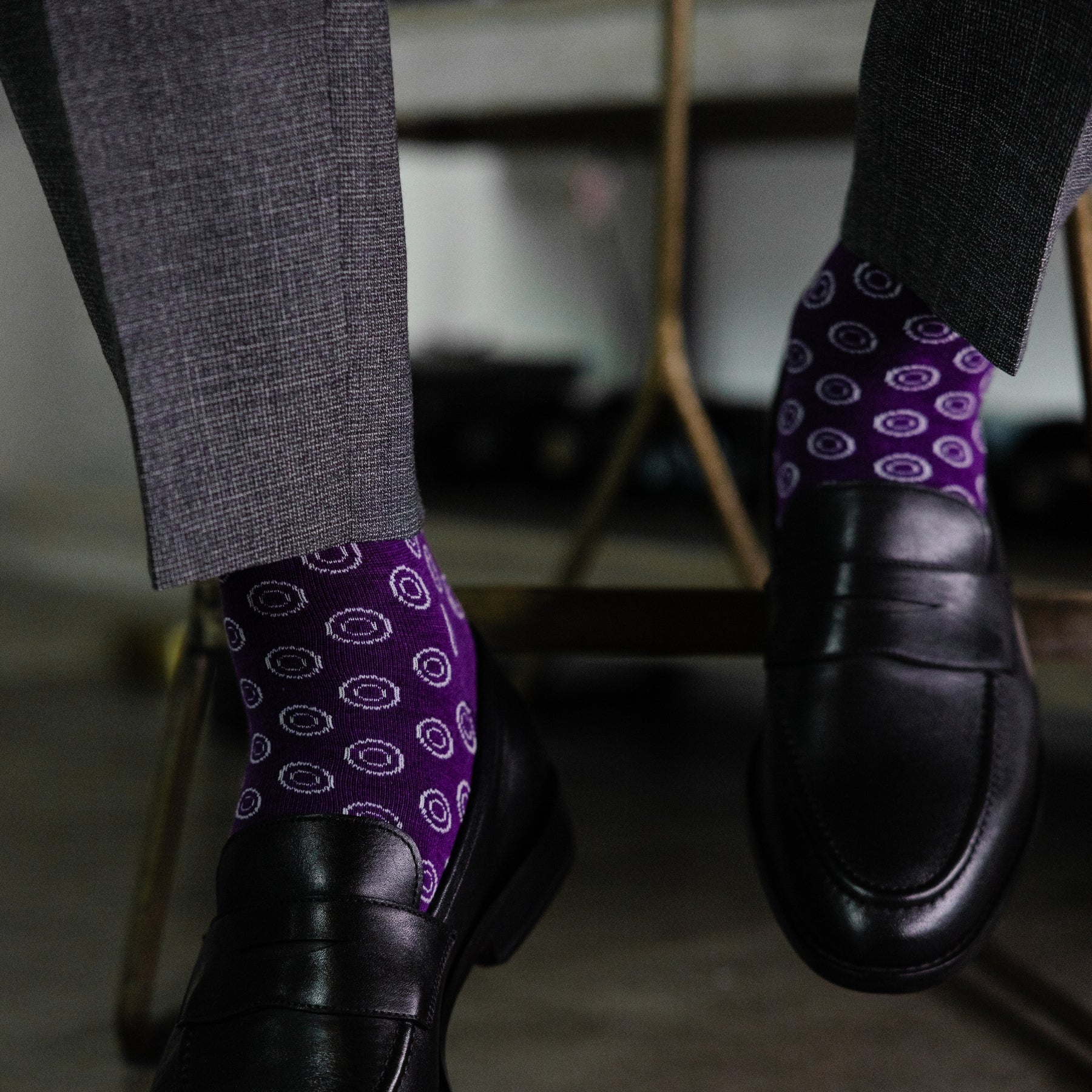 a deep purple men's dress sock with a white double dot pattern