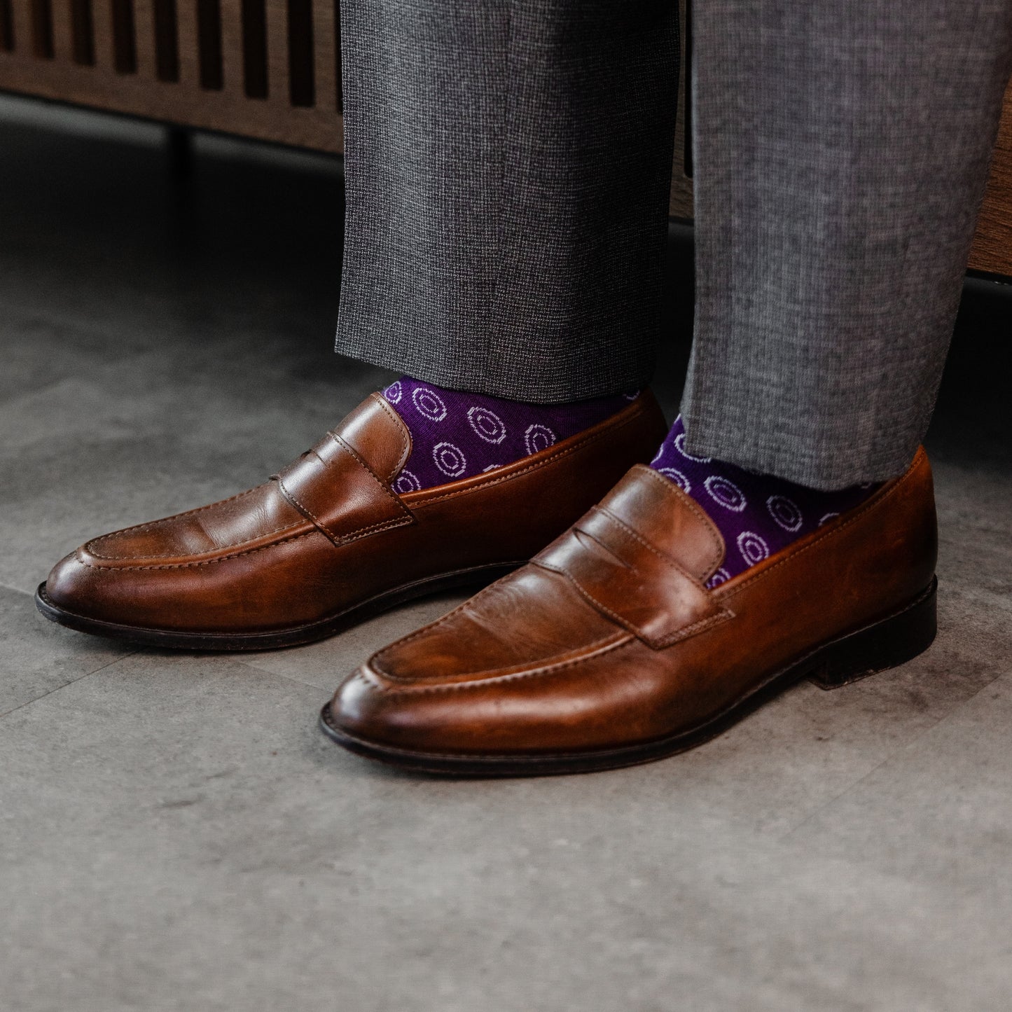 a deep purple men's dress sock with a white double dot pattern