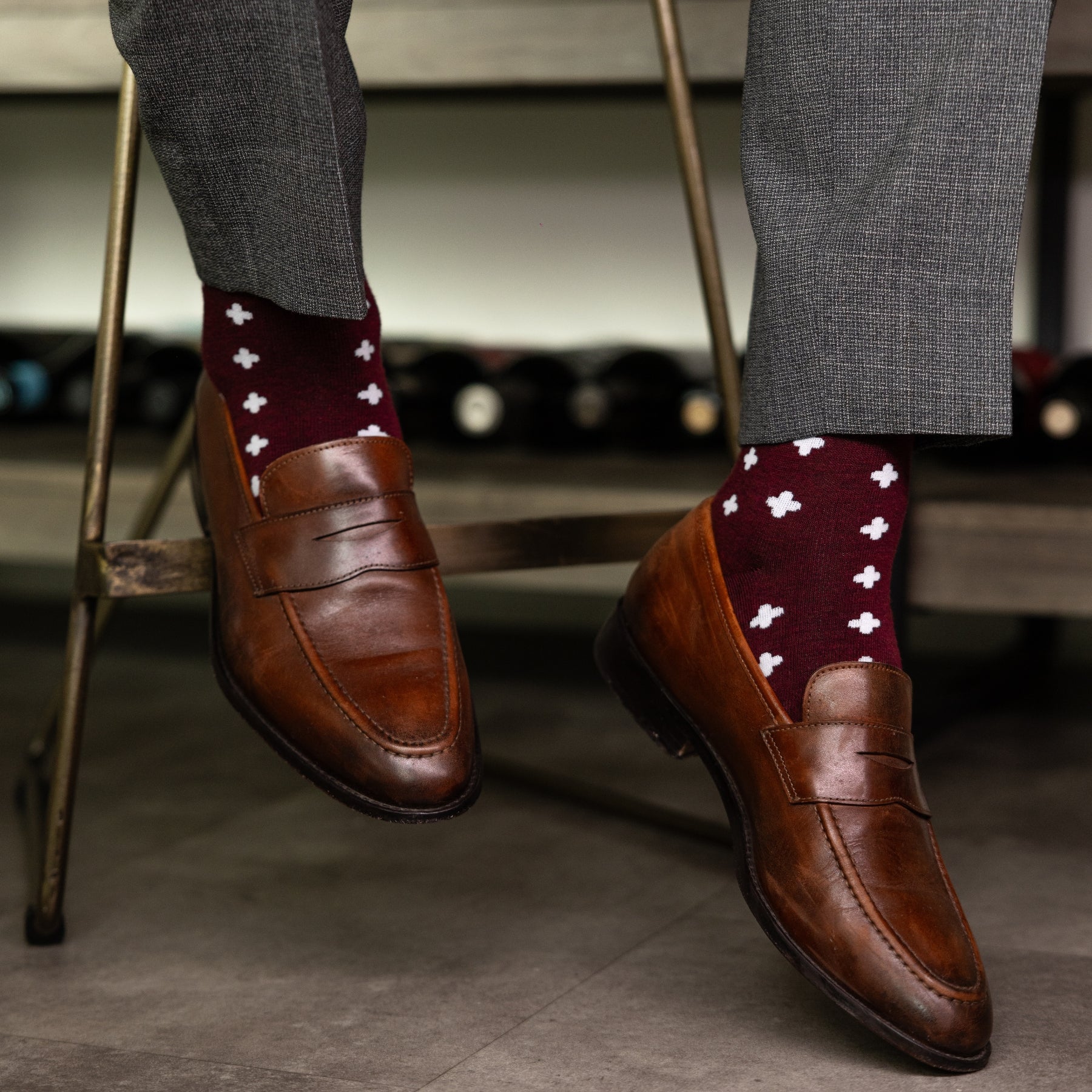 a deep red sock with a white hatch pattern