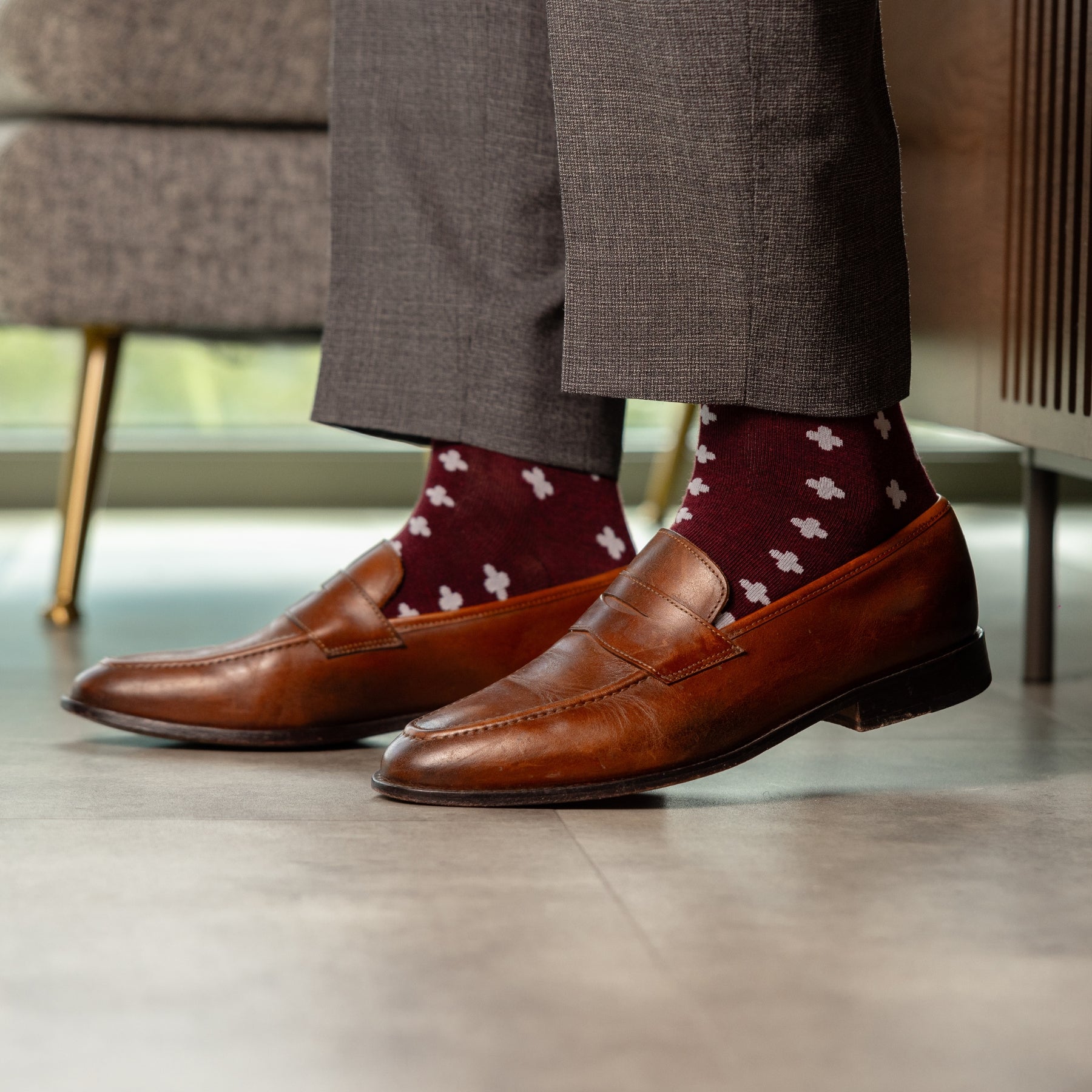 a deep red sock with a white hatch pattern